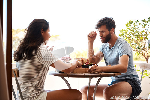 Image of Home food, breakfast and couple eating meal, morning brunch or lunch on Valentines Day date on balcony. Love, marriage and romantic man, woman or people bonding, care and enjoy quality time together