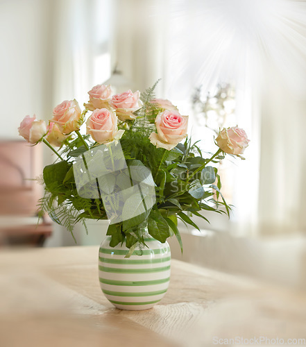 Image of Closeup of bouquet of pink roses in a vase, nature and flowers on living room table, gift for romance or friendship. Plant, botanical and symbol of love, natural and floral arrangement at home