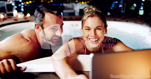 Image of Tablet, selfie and couple in hot tub at spa for holiday, romantic vacation and weekend getaway. Water, marriage and man and woman take picture for social media on honeymoon, anniversary and relax