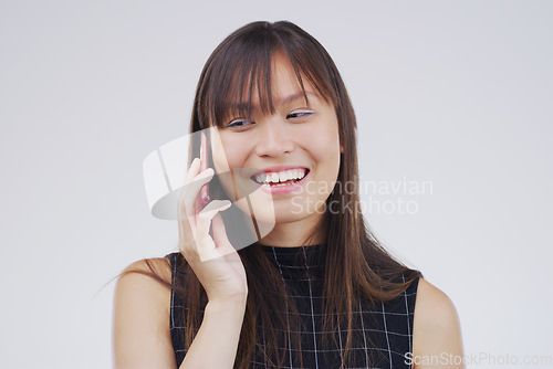 Image of Phone call, talking and Asian woman in studio smile for conversation, speaking and chatting. Communication mockup, white background and female person on smartphone for network, contact and connection