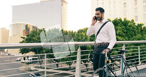 Image of Phone call, business man and bike in city to travel with eco friendly transport. Cellphone, bicycle and happy male professional talking, speaking or discussion while walking on cycling street outdoor