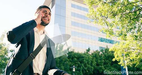 Image of Phone call, business man and smile in city, talking and speaking to contact. Cellphone, funny and male professional in urban street for discussion, communication and mobile conversation in low angle.