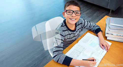 Image of Happy boy, student and portrait with book for studying, learning or education in math at home on mockup. Smart little kid or child and smile for mathematics, textbook or problem solving on study desk