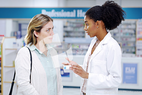 Image of Pharmacy, medicine and pharmacist help woman with pills, assistance and medical advice in drugstore. Healthcare, shopping or female worker consulting customer for product, prescription and medication