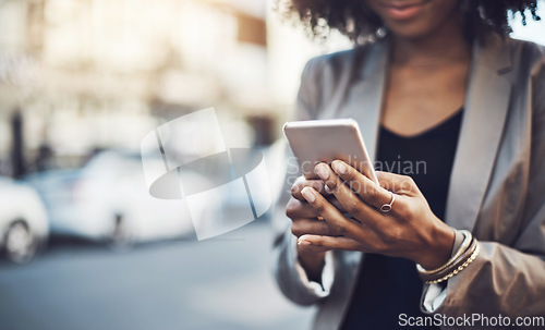 Image of Woman, hands and phone in city for communication, social media or chatting and texting outdoors. Hand of business female on mobile smartphone for online browsing, travel or networking in a urban town