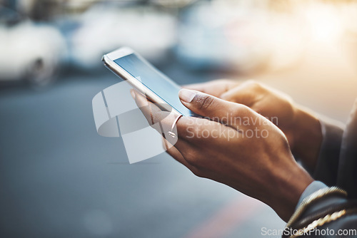 Image of Woman, hands and phone in city for communication, social media or texting on street sidewalk outdoors. Hand of female chatting on mobile smartphone for networking, online browsing or travel in town