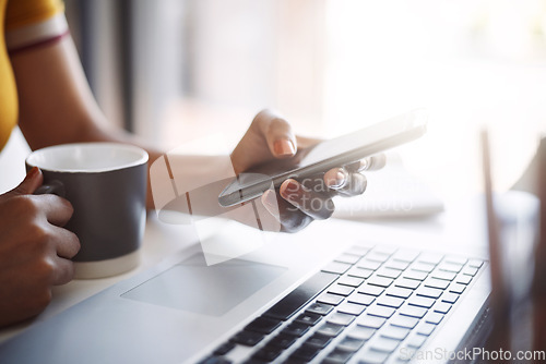 Image of Hands, smartphone and texting closeup with laptop, coffee and work in home office or shopping, browsing and mobile communication. Woman, social media and keyboard or scrolling, online and search