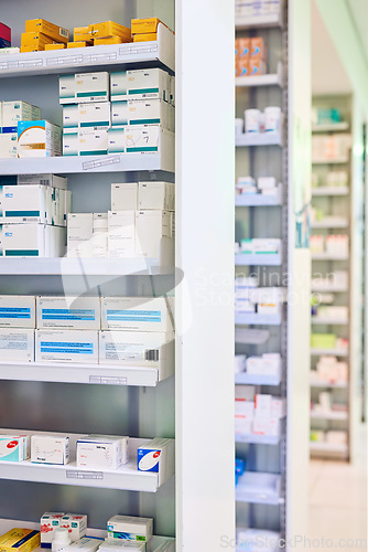 Image of Pharmacy, shelf and boxes for healthcare, empty or pharmaceutical stock for wellness, health and interior. Shop, store and retail product with storage, choice or sale for medicine, discount and drugs