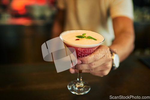 Image of Fruit cocktail glass, hands and bartender with alcohol at pub, night club or drinks bar for restaurant service. Nightclub diner, liquid drink and hands of waiter with drink or beverage for person