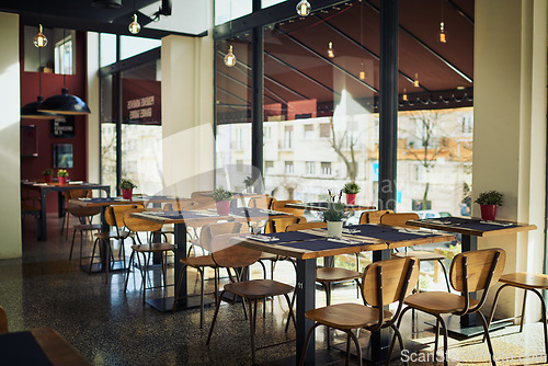 Image of Empty restaurant cafe, deli or store for retail services, hospitality industry or sales service. Interior design decor, breakfast coffee shop and trendy small business with furniture, chair and table