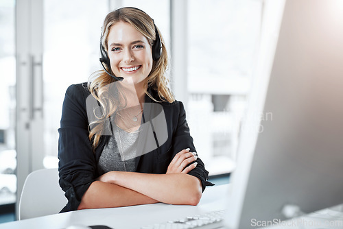 Image of Happy woman, callcenter and arms crossed in portrait, contact us with communication and CRM. Customer service, phone call and female consultant with headset and smile, help desk and tech support