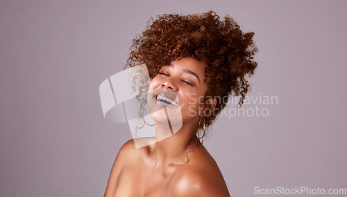 Image of Beauty, skincare and laugh with woman in studio for hair style, cosmetics or natural makeup. Facial, happy and glow with female model isolated on background for spa mockup, self care or shine