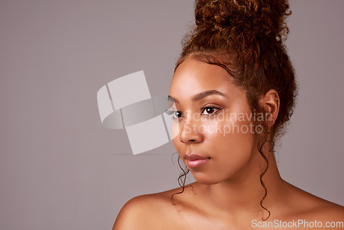 Image of Glow, skincare and space with woman in studio for hair style, cosmetics or natural makeup. Facial, beauty and spa with female model isolated on background for mockup, self care or shine