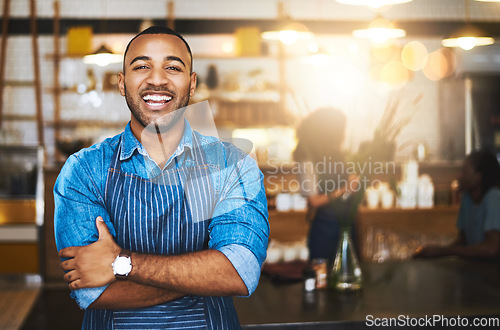 Image of Coffee shop, happy barista and portrait of black man in cafe for service, working and crossed arms. Small business owner, restaurant and professional male waiter smile in cafeteria ready to serve