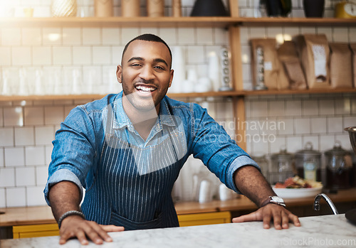 Image of Coffee shop, barista and happy portrait of black man in restaurant for service, working and welcome in cafe. Small business owner, bistro startup and male entrepreneur smile by counter ready to serve