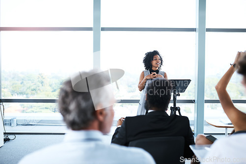 Image of Seminar, presentation and woman presenter in the office boardroom for a business conference. Corporate speech, speaker and female manager talking at a tradeshow, meeting or workshop in the workplace.