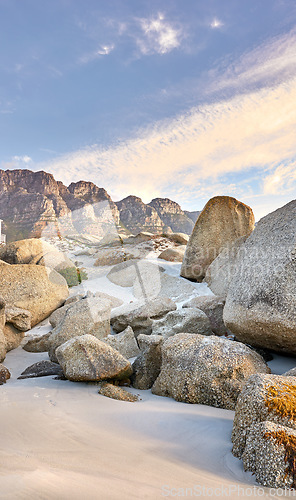 Image of Rocks, beach and landscape with travel and environment, holiday destination in South Africa with nature and outdoor. Coastal location, natural scenery and fresh air, seascape and tropical adventure