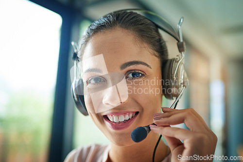 Image of Happy woman, call center and portrait with headphones in customer service and telemarketing at office. Face of female person, consultant and agent smile with headset mic to contact us for sales