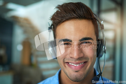 Image of Happy businessman, call center and portrait smile for customer service, support or telemarketing at the office. Friendly man person, face or consultant agent smiling for online advice in contact us