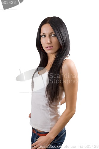 Image of The beautiful young woman in jeans. Isolated on white background