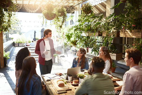 Image of Presentation, restaurant and business people in meeting for discussion, planning and communication. Coffee shop, teamwork and men and women talking for team building, collaboration and project ideas