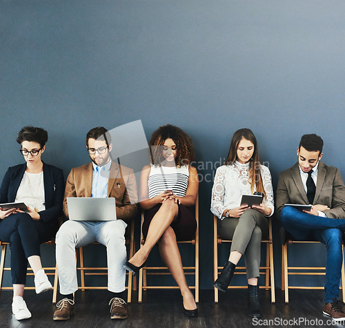 Image of Business people, hiring and busy before a job interview waiting room and sitting in line. Online communication, technology and staff with diversity and wall background for recruit meeting with mockup