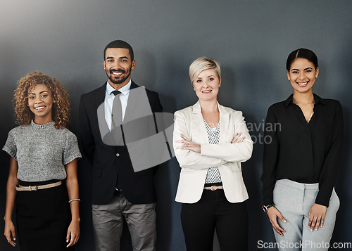 Image of Diversity, support and portrait of business people in studio for smile, community and teamwork. Happy, collaboration and professional with employees and wall background for confidence and mission