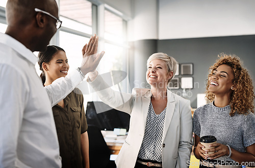 Image of High five, winner and target with business people in office for success, motivation and agreement. Support, goals and leader with group of employees for teamwork, collaboration and solidarity