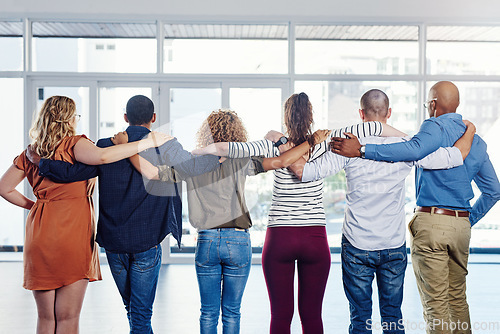 Image of Support, teamwork and hug with back of people for motivation, community and diversity. Solidarity, faith and collaboration with group of friends for trust, gratitude and kindness together