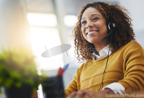 Image of Young african woman, call center agent or listen on voip headset with mockup space, lens flare or contact. Girl, customer service or tech support crm with smile, headphones or microphone at help desk