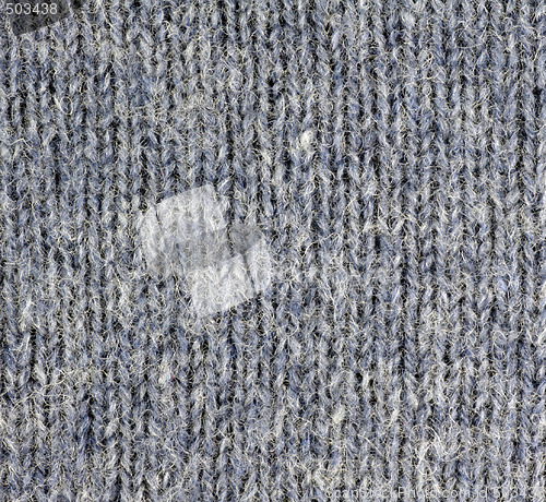 Image of Used woolen sweater close up