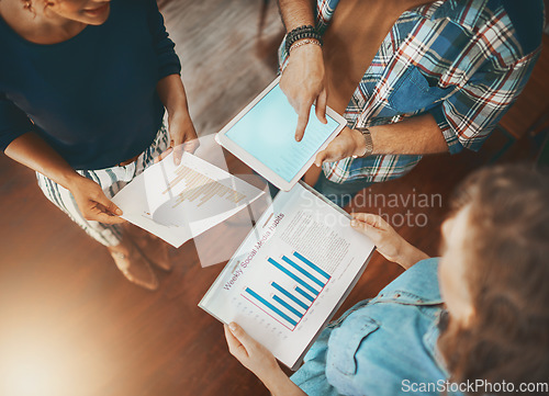 Image of Above, graphs or hands of business people with tablet planning a project with charts or data research. Teamwork, finance paperwork or financial accountants documents in meeting for a digital strategy