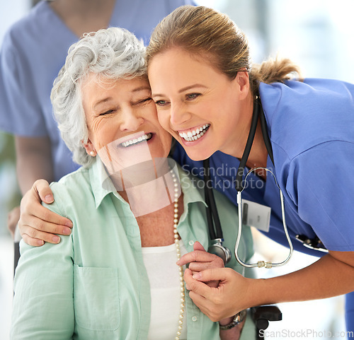 Image of Nurse, senior woman and happy hug of caregiver and smile with support and care in hospital. Wheelchair, patient and healthcare employee help person with a disability with love in a health clinic