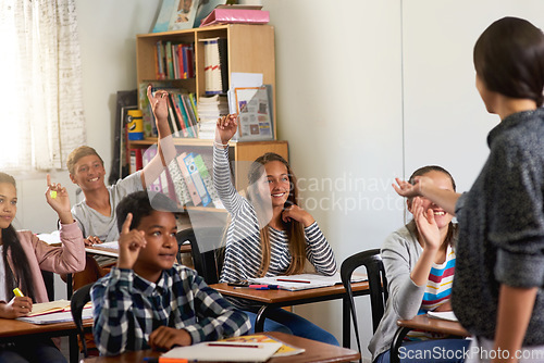 Image of Question, teacher and hands of children in classroom for answer in lesson, learning and education. Child development, school kids and young students with hand up for asking, feedback and knowledge