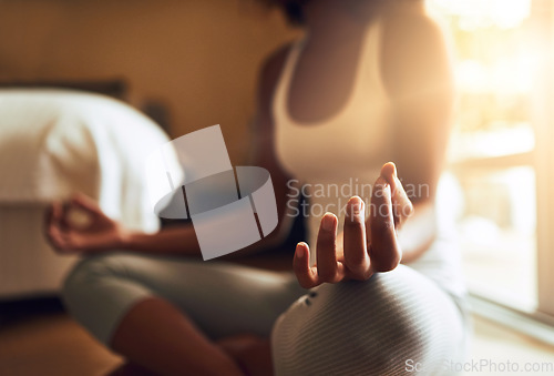 Image of Woman, hands and yoga in morning meditation for health, spiritual wellness or zen workout and exercise at home. Hand of calm female meditating for relaxation, mind and awareness for mental wellbeing