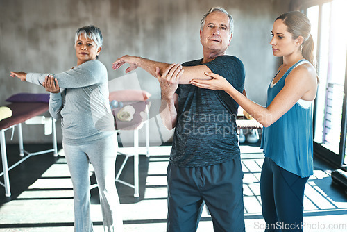 Image of Stretching, physical therapy and old man with personal trainer for fitness, wellness or helping. Health, workout or retirement with senior patient and physiotherapist in class for warm up training
