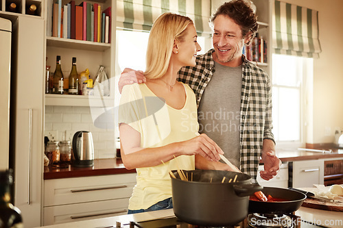 Image of Dinner, support or happy couple kitchen cooking with healthy food or vegetables for lunch together at home. Affection or woman helping, speaking or talking to husband in meal prep in Australia