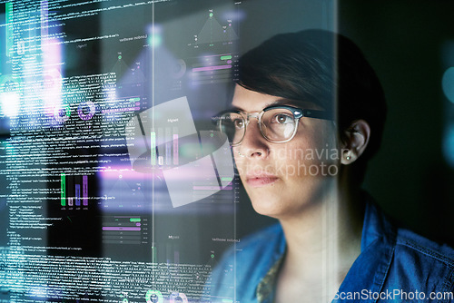 Image of Night, code and hologram with woman in office for programming, future and software development. Big data, networking and technology with female developer for cloud computing, programmer and coding