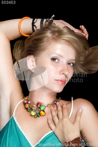 Image of Portrait of the beauty blonde. Isolated on black