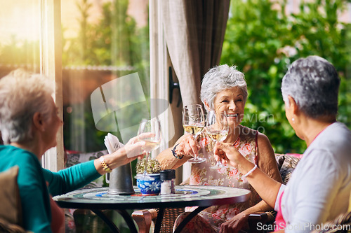 Image of Cheers, wine glasses and senior women or friends in retirement, reunion or social celebration, success and happy. Champagne, celebrate and elderly people or customer toast, restaurant and hospitality