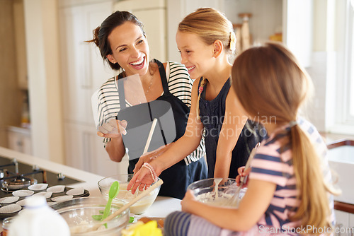 Image of Mom, happy family or children baking in kitchen with siblings learning cookies recipe or mixing pastry at home. Laughing, funny or mother helping or teaching kids to bake together for cooking skills