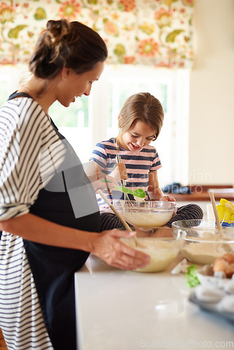 Image of Mom, pregnant or girl baking in kitchen as a happy family with a kid learning cookies or cake recipe at home. Maternity, cooking or mother baker helping or teaching child to bake for development