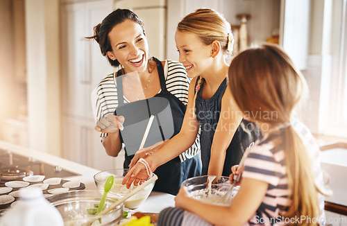 Image of Mother, happy family or children baking in kitchen with siblings learning cookies recipe or mixing pastry. Laughing, funny or mom helping or teaching kids to bake together for cooking skills at home