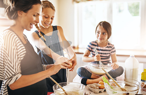 Image of Happy mother, family or kids baking in kitchen with siblings learning cookies recipe or mixing pastry at home. Mom, cooking or baker helping or teaching children to bake together for development