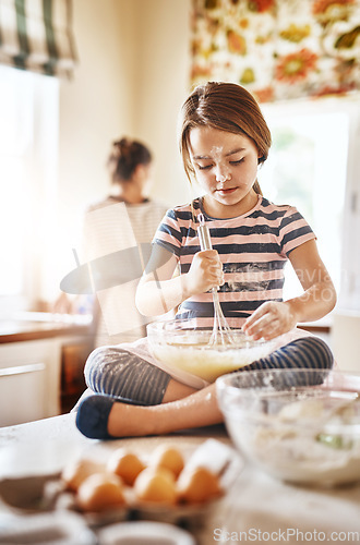 Image of Fun, mixing flour or girl baking in kitchen for cookies pastry or cooking recipe preparation at home. Bowl, playful or young child learning to bake for skills development or independence in a house