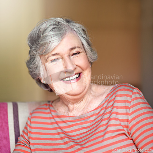 Image of Portrait, senior woman and smile in nursing home, living room or relax in retirement and happy in house. Elderly, happiness and healthy person laughing at funny, joke or freedom of retired life