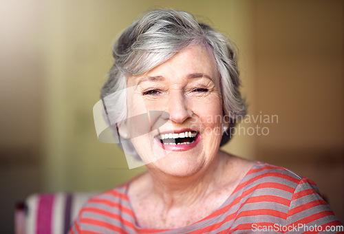 Image of Portrait, nursing home and happy senior woman in living room, laughing in house or relax in retirement. Elderly lady, happiness and healthy person laughing at funny, joke or freedom of retired life