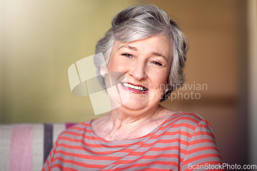 Image of Portrait, nursing home and happy senior woman in living room, laughing in house or relax in retirement. Elderly lady, happiness and healthy person smile for funny, joke or freedom of retired life