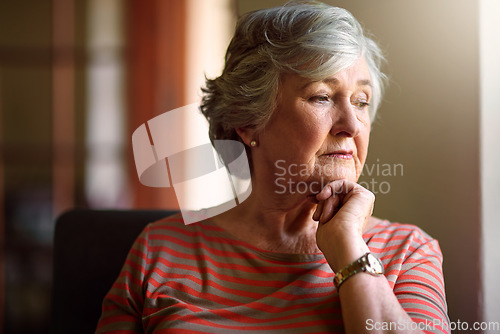 Image of Senior woman, worry and thinking at window with memory, ideas and home on living room sofa. Elderly lady, remember and think with decision, depression and retirement on lounge chair, house and fear