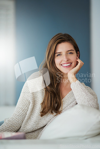 Image of Portrait, happy and woman relax on sofa in home living room for easy lifestyle. Face, smile or young female person from Canada on couch in lounge, apartment or house to enjoy me time, break or mockup